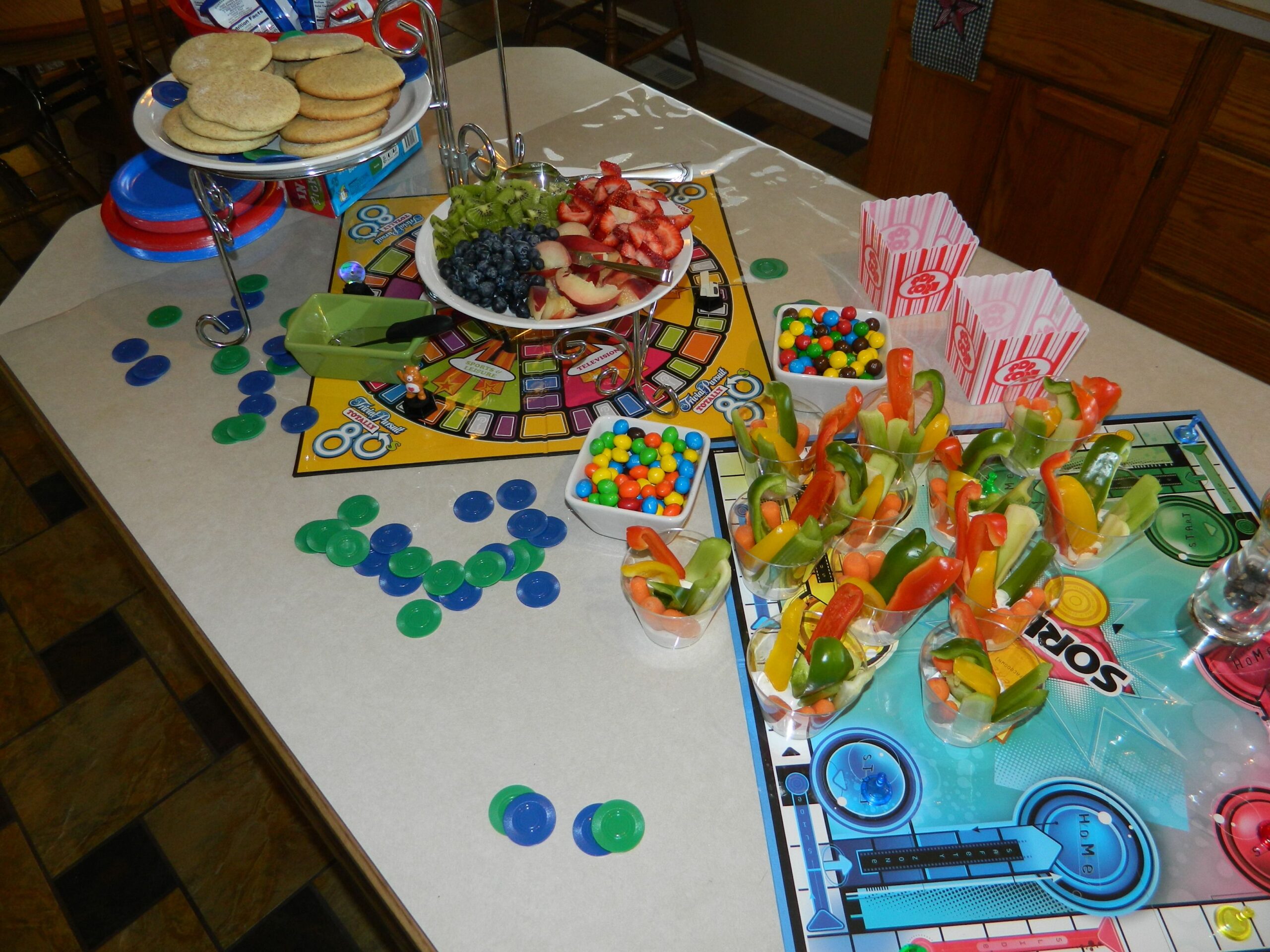Birthday-themed board game with party decorations