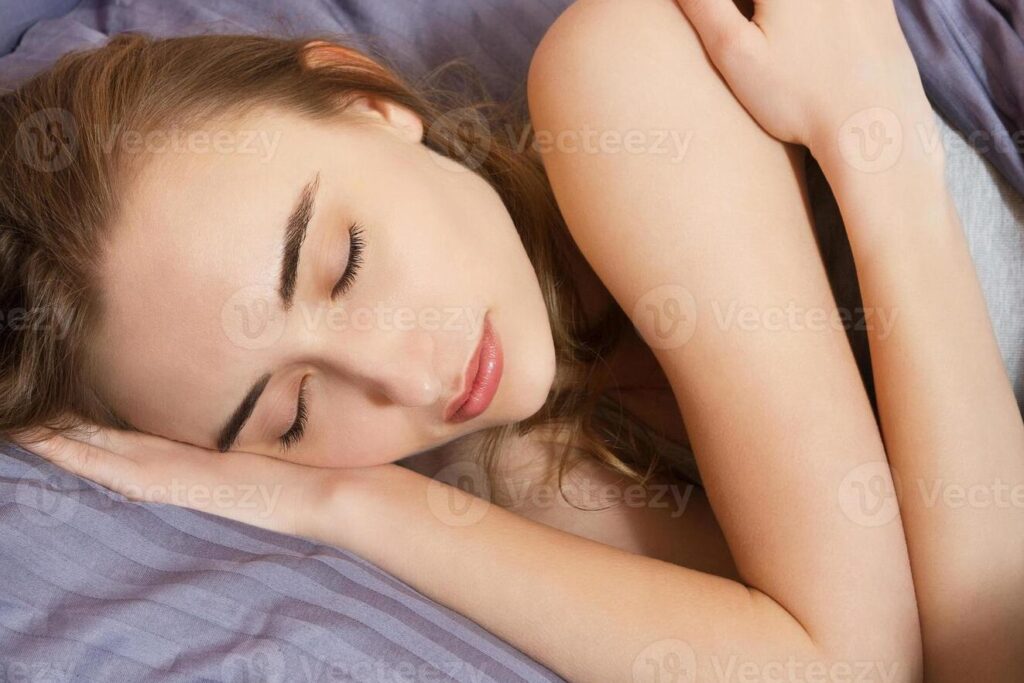 imagen de persona durmiendo placenteramente en una cama